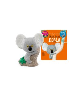 Spielzeug-Koala auf einem Baum, im Hintergrund ein oranges Buch: Trau Dich, Koala-Bär.