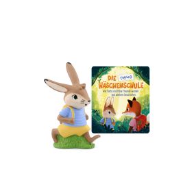 Hasenfigur im blauen Hemd und gelber Hose neben dem Buch Die neue Häschenschule.