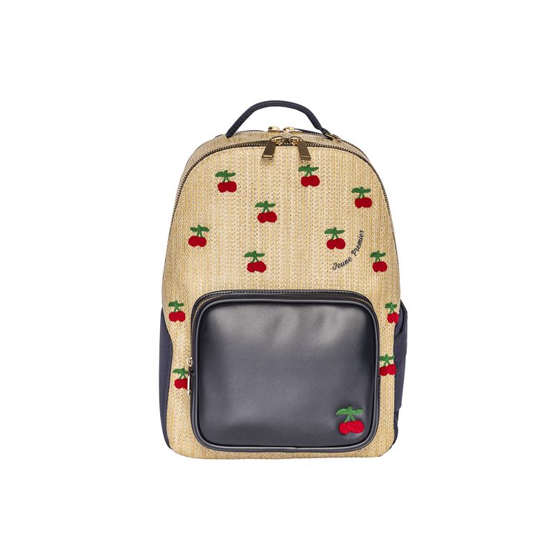 Beiger Rucksack mit kleinen roten Kirschmotiven und schwarzer Fronttasche vor weißem Hintergrund. Beiger Rucksack mit kleinen roten Kirschmotiven und schwarzer Fronttasche vor weißem Hintergrund.