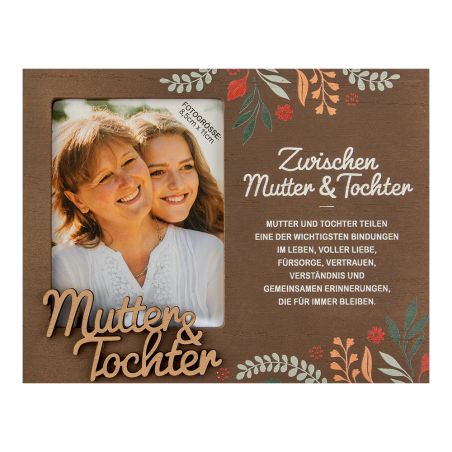 Zwei lächelnde Frauen, vermutlich Mutter und Tochter, in geblümter Holzrahmung mit deutschem Text zu ihrer Bindung.