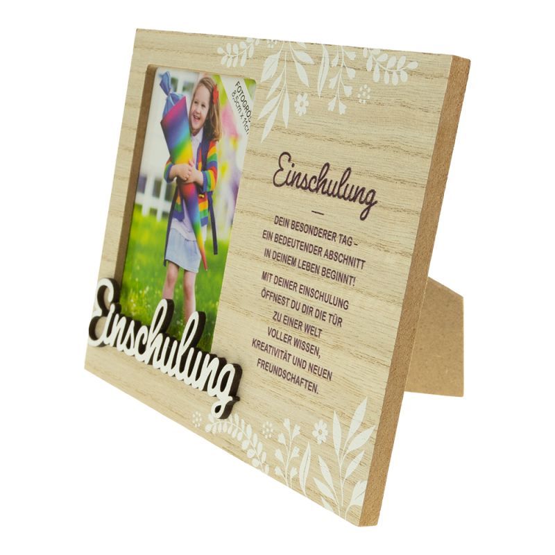 Holzrahmen mit Einschulung-Schriftzug, Kinderfoto und deutschsprachigem Spruch zur Schule.