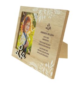 Holzrahmen mit Blumenmuster, Mädchenfoto und deutschem Text zur Bedeutung des Namens Lia.