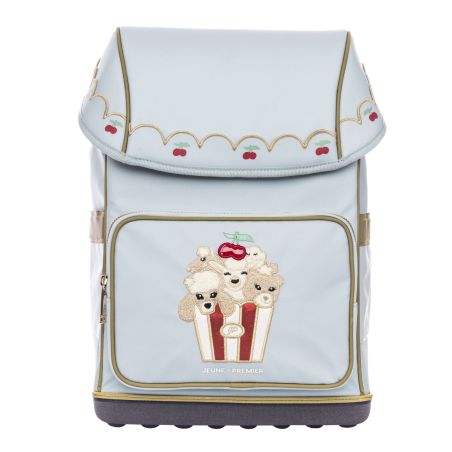Hellblauer Rucksack mit goldenen Akzenten, Kirschmotiv und gestickten Hunden im Popcorneimer auf der Fronttasche.