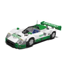 Weiß-grünes Spielzeugrennwagenmodell mit MAZDA-Logo und der Nummer 201 an den Seiten sowie am Heckspoiler.