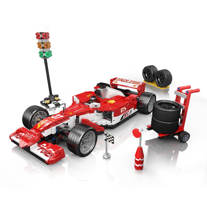 Rotes LEGO-Rennauto mit Ersatzreifen, Wagen, Ampel und Zielflagge auf weißem Hintergrund. Rotes LEGO-Rennauto mit Ersatzreifen, Wagen, Ampel und Zielflagge auf weißem Hintergrund.