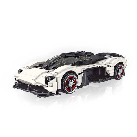 Weißes LEGO-Sportwagenmodell mit roten Felgen und schwarzen Details vor weißem Hintergrund.