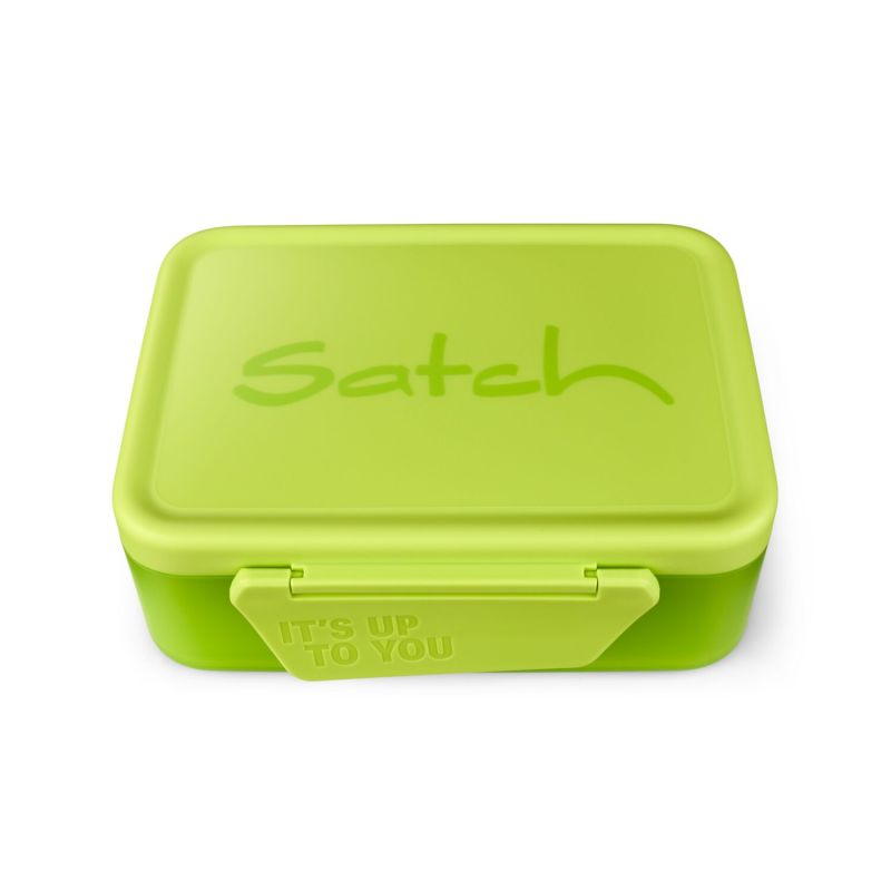 Grüne Brotdose mit Satch auf dem Deckel und Its up to you am Verschluss, von oben gesehen.