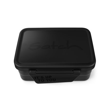 Schwarze Brotdose mit Satch-Logo auf dem Deckel und ITS UP TO YOU am Verschluss.