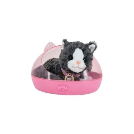 Schwarz-weißes Stoffkatzen-Spielzeug sitzt nach vorne gerichtet in einem pinken Plastikbett.