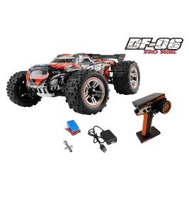 Ferngesteuerter Monstertruck mit Zubehör: Akku, Ladegerät, Werkzeug und Fernbedienung.