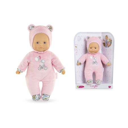 Babypuppe im rosa Bärenkostüm, einmal außerhalb und einmal innerhalb der Verpackung gezeigt.