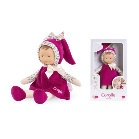 Weiche Puppe im rosa Outfit mit Blumenakzenten, sitzend in weißer Corolle-Verpackung. Weiche Puppe im rosa Outfit mit Blumenakzenten, sitzend in weißer Corolle-Verpackung.
