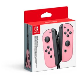 Nintendo Switch Joy-Con in Pastellrosa in Originalverpackung mit rotem Deckel.