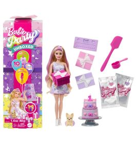Barbie Party-Set mit Puppe, Geschenken, Torte, Hund und Zubehör. Verpackung links im Bild.
