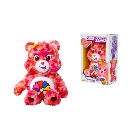 Bunter Care Bears Kuschelbär mit Regenbogenblume auf dem Bauch, neben passender Verpackung.