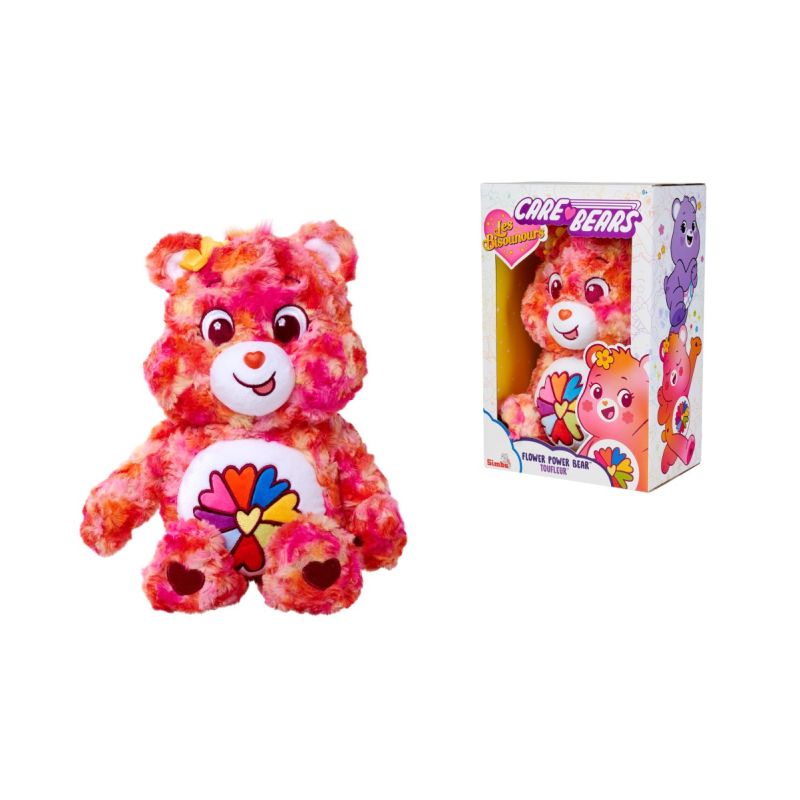 Bunter Care Bears Kuschelbär mit Regenbogenblume auf dem Bauch, neben passender Verpackung.