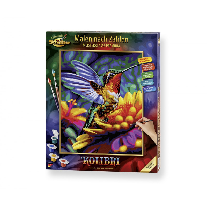 Malset-Box mit buntem Kolibri und Blumen, daneben Farben und Pinsel.