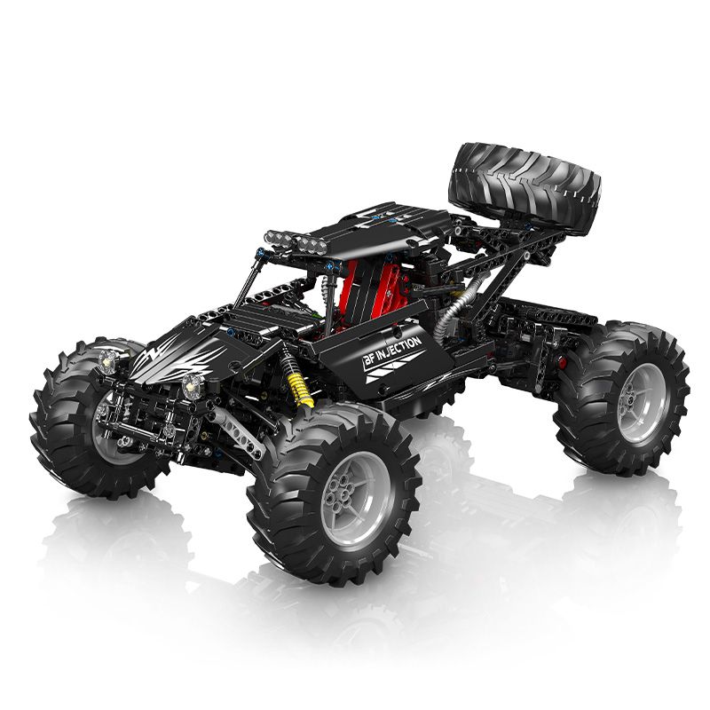 Schwarzer und roter Spielzeug-Buggy mit großen Gummireifen, aus zusammensteckbaren Kunststoffbausteinen gebaut. Schwarzer und roter Spielzeug-Buggy mit großen Gummireifen, aus zusammensteckbaren Kunststoffbausteinen gebaut.