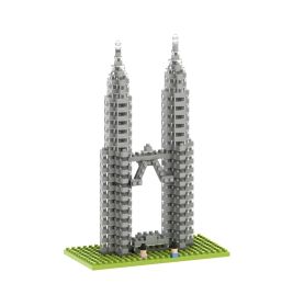Graues Petronas-Twin-Towers-Modell aus Steinen auf grüner Platte.