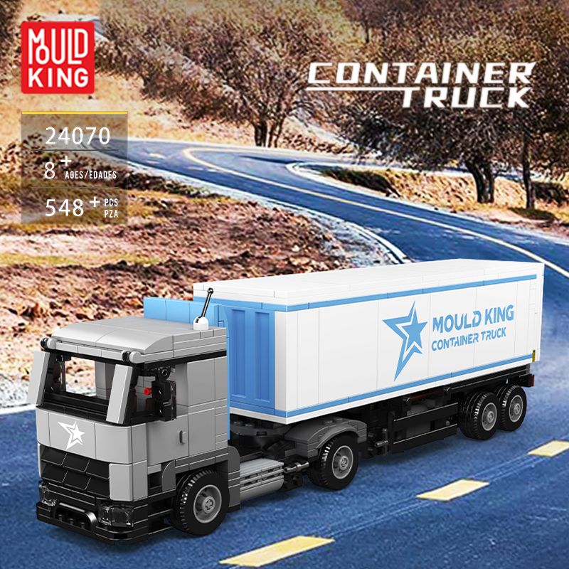 Modell eines Container-LKWs von Mould King auf einer kurvigen Straße vor braunen Hügeln.