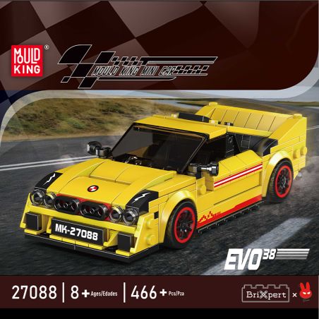 Gelbes Sportwagenmodell aus Bausteinen mit schwarzen und roten Details vor Rennstrecken-Hintergrund.