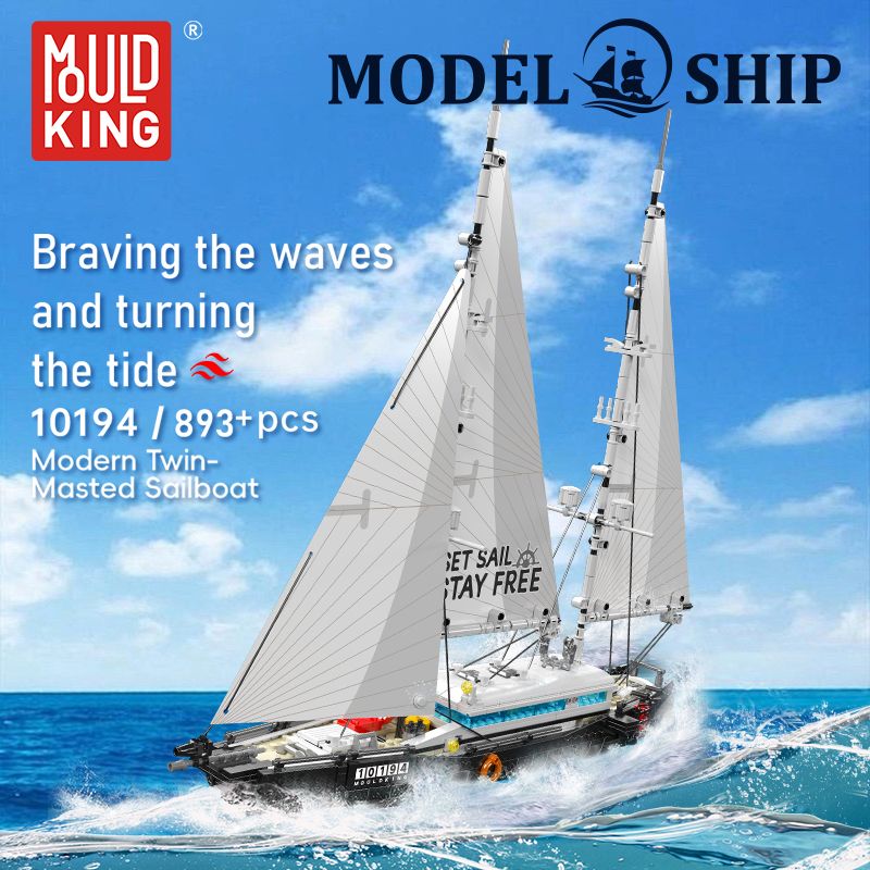 Ein Modellbausatz eines Zweimasters mit weißen Segeln fährt auf dem Meer unter blauem Himmel. Ein Modellbausatz eines Zweimasters mit weißen Segeln fährt auf dem Meer unter blauem Himmel.