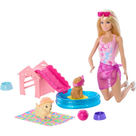 Barbie-Puppe kniet am Pool mit zwei Hundewelpen, rosa Rutsche, Spielmatte und Zubehör.