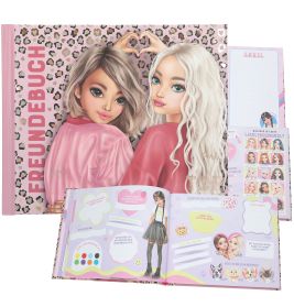 Zwei gezeichnete Mädchen mit großen Augen formen Herz-Hände auf einem rosa Freundschaftsbuch.