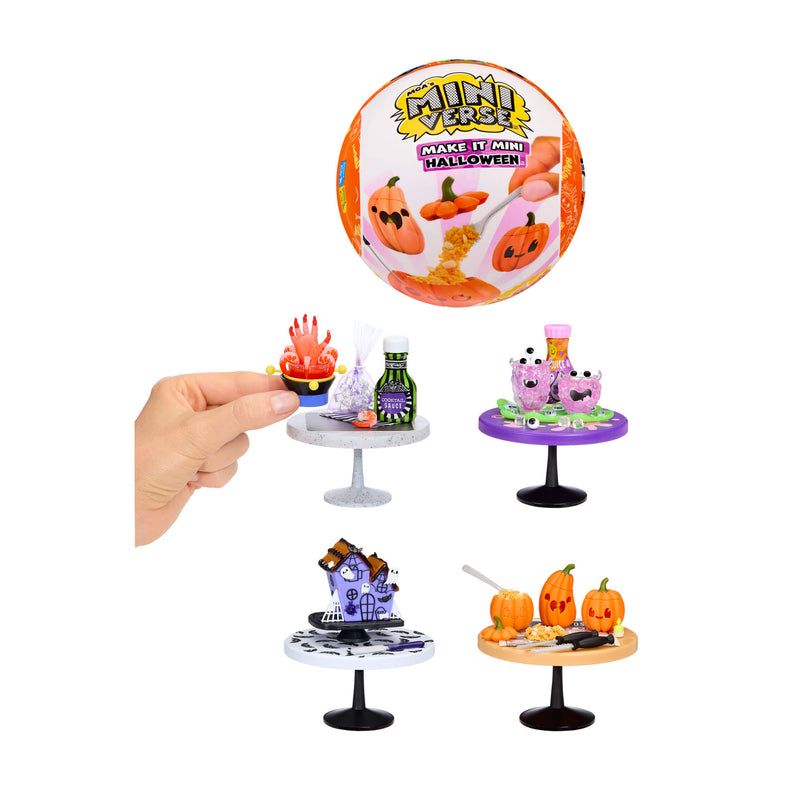 Mini-Halloween-Desserts auf Ständern mit orangener Mini-Verse-Verpackung und einer Hand am Stand.