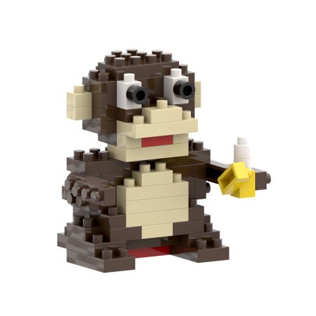 Pixeliges Affen-Spielzeug aus braunen Bausteinen hält eine gelbe Banane auf weißem Hintergrund.