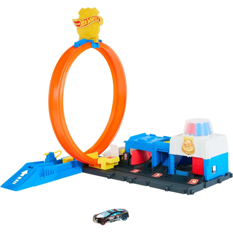 Hot Wheels Spielset mit orangener Schleife, blauem Starter und kleinem schwarzen Spielzeugauto vorne. Hot Wheels Spielset mit orangener Schleife, blauem Starter und kleinem schwarzen Spielzeugauto vorne.