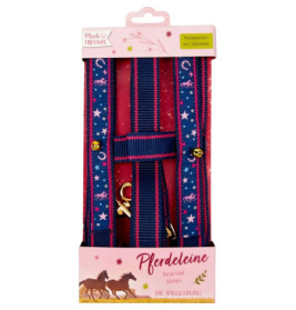 Blaues Führhalfter mit pinken Sternen und zwei goldenen Glöckchen in rosa Box mit Pferdemotiven verpackt.