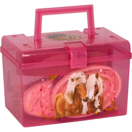 Pinke Box mit Griff, Pferdemotiven und pinken Pferdebürsten.