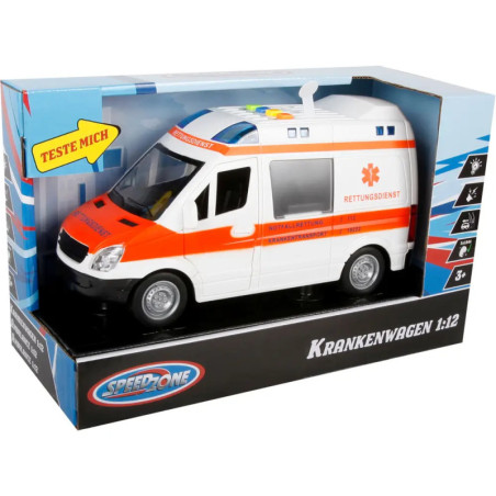 Spielzeug-Krankenwagen 1:12 in Box mit Aufdruck Teste Mich und Krankenwagen auf der Verpackung.