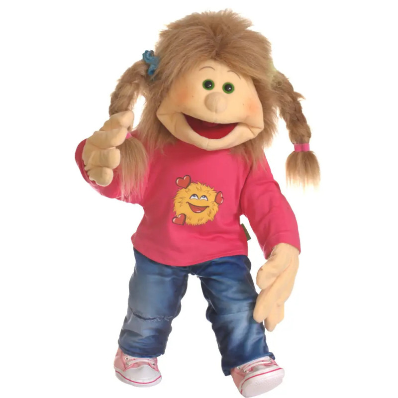 Eine Puppe mit Zöpfen, pinkem Shirt mit Comic-Gesicht, blauer Jeans und pinken Schuhen.