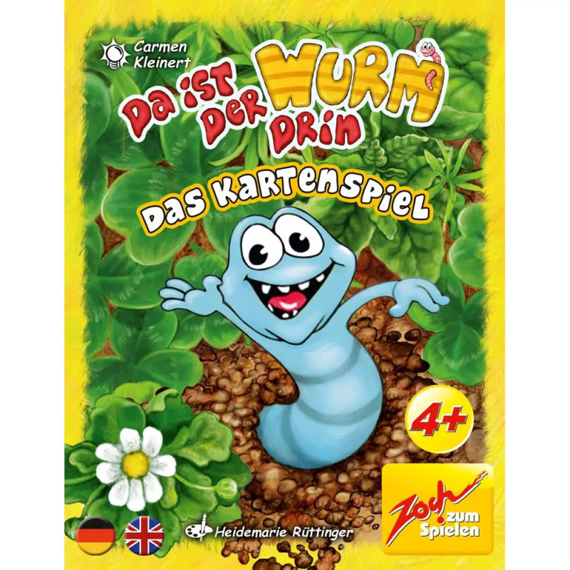 Blauer Cartoon-Wurm lächelt in Erde mit Blättern und Blume auf bunter Spielebox für Kinder ab 4 Jahren.