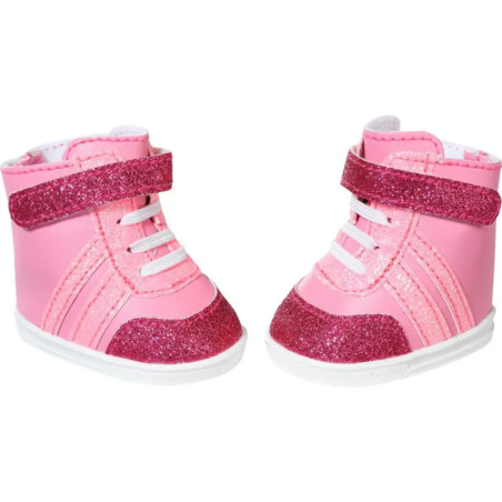 Rosa Babyschuhe mit glitzernden Details und weißen Sohlen. Rosa Babyschuhe mit glitzernden Details und weißen Sohlen.
