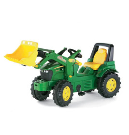Grün-gelber Kinder-Traktor mit Frontlader und gelbem Sitz zum Aufsitzen.