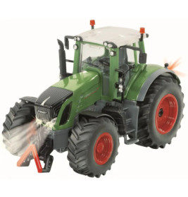 Grüner Spielzeugtraktor mit roten Rädern, schwarzen Akzenten und durchsichtigem Dach auf weißem Hintergrund.
