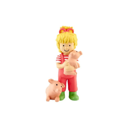 Spielfigur eines lächelnden Kindes in roten Overalls mit einem Ferkel im Arm und einem weiteren an den Füßen.