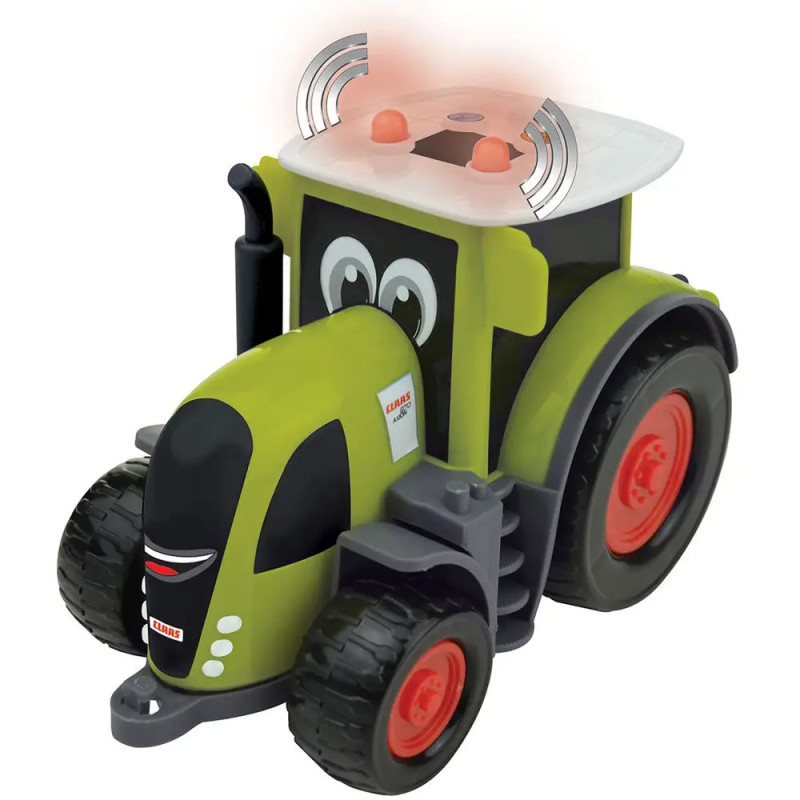 Grüner Spielzeugtraktor mit Cartoon-Augen, roten Rädern und Blinklichtern auf weißem Hintergrund.