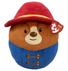 Runder Plüschbär mit rotem Hut, blauem Mantel und Ty-Anhänger am Ohr.