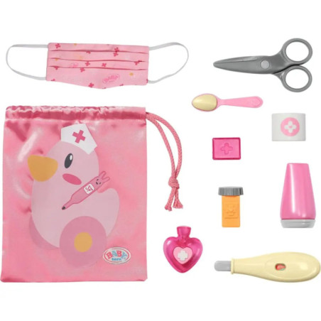 Rosa Arztspielzeug-Set mit medizinischen Werkzeugen, Gesichtsmaske und Beutel mit Enten-Krankenschwester-Motiv. Rosa Arztspielzeug-Set mit medizinischen Werkzeugen, Gesichtsmaske und Beutel mit Enten-Krankenschwester-Motiv.