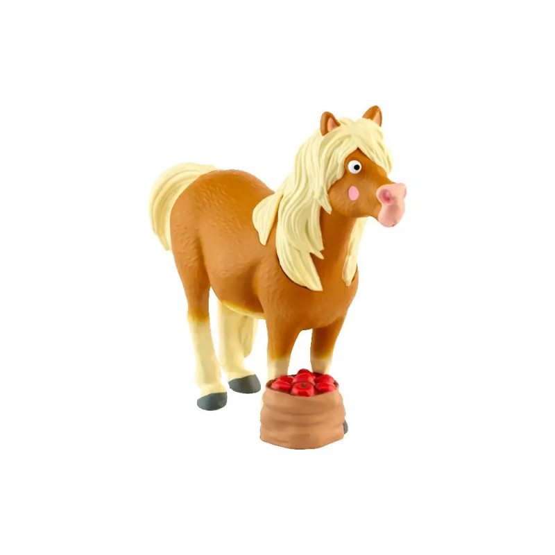 Spielzeugpferd mit blonder Mähne steht neben einem Korb mit roten Äpfeln auf weißem Hintergrund.