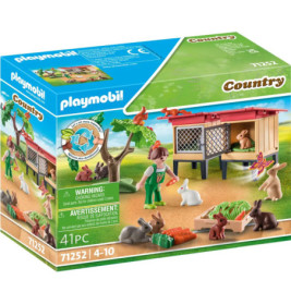 Playmobil Country Spielset mit Kaninchen, Stall, Karotten und einer Kinderfigur auf der Vorderseite der Box.