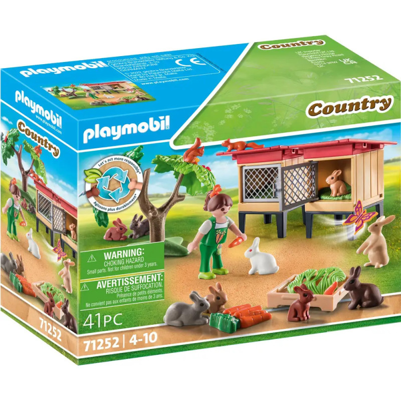 Playmobil Country Spielset mit Kaninchen, Stall, Karotten und einer Kinderfigur auf der Vorderseite der Box.