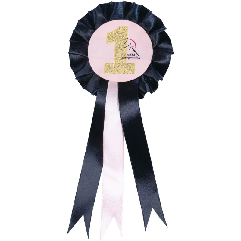 Schwarze und pinke Rosette mit goldener 1 in der Mitte und zwei herabhängenden Bändern.