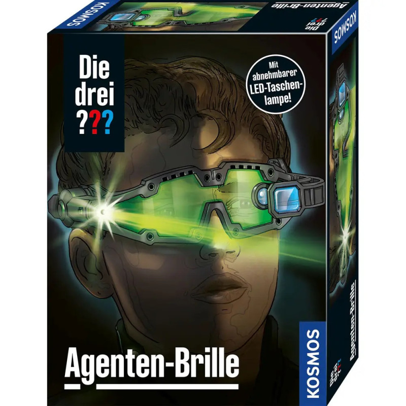 Box mit Person, die grüne LED-Agentenbrille trägt Text: Agenten-Brille und Die drei ???. Box mit Person, die grüne LED-Agentenbrille trägt Text: Agenten-Brille und Die drei ???.