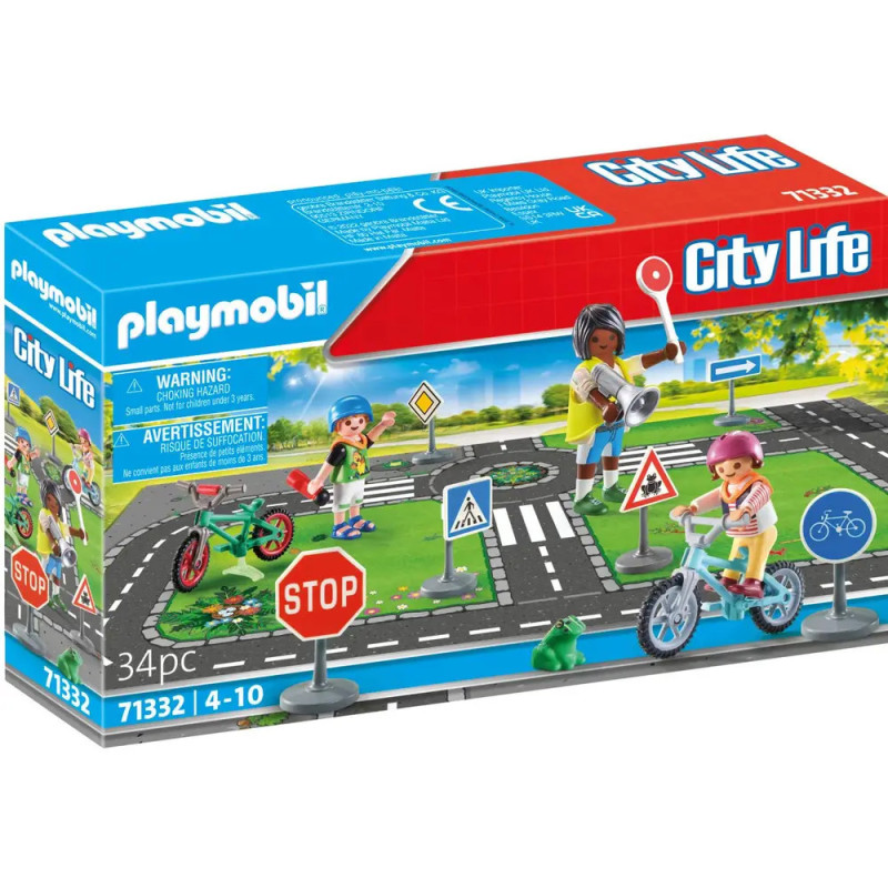 Playmobil City Life-Set: Box mit Kindern auf Fahrrädern, Straßenschildern und Straßen, 34 Teile, ab 4 Jahren.