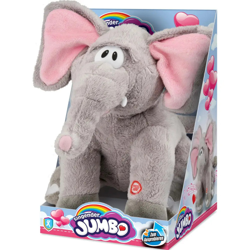 Grauer Plüschelefant mit rosa Ohren sitzt in bunter Verpackung mit der Aufschrift Singender Jumbo. Grauer Plüschelefant mit rosa Ohren sitzt in bunter Verpackung mit der Aufschrift Singender Jumbo.